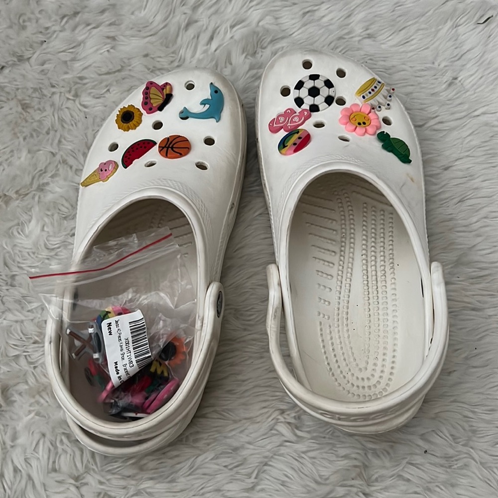 White crocs (charms included)